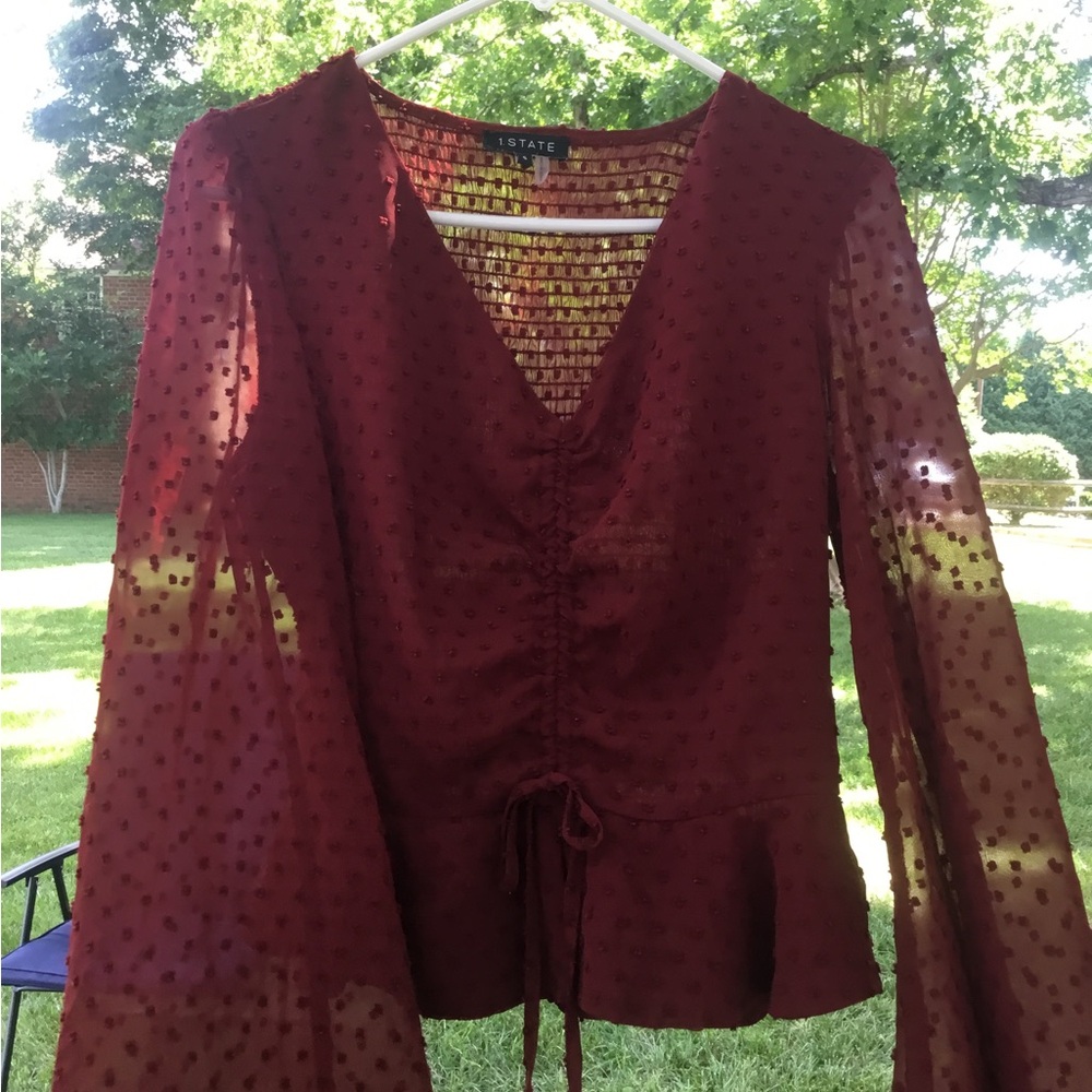 1. State Red Tie Front Peplum Blouse